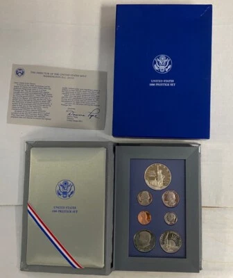 1986 US Mint Prestige Proof Set Silver Dollar Ellis Island 7 Coin Set Suede Case - Image 1 of 4