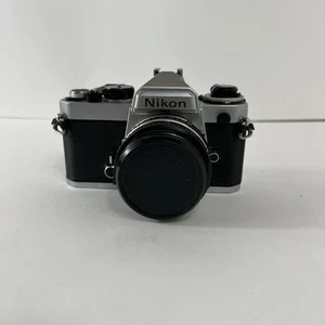 Nikon FE analoge Spiegelreflexkamera silber 35 mm Gehäuse und Objektive 50 mm 1:1.8 Serie E kein Test - Bild 1 von 11