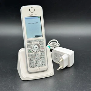 AVM FRITZ!Fon C4 Telefon (Farbdisplay, beleuchtete Tasten mit Ladeschale Weiß) - Zdjęcie 1 z 2