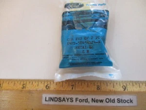 2 UNOPENED PCS FORD 1984/1989 ESCORT LUGGAGE COVER "RETAINER" E4FZ-58454A24-A - Picture 1 of 3