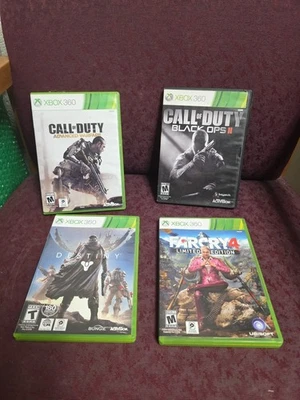 Xbox 360 Lot (4)~C.O.D. Black Ops 2, Modern Warfare, Destiny, & Far Cry 4 L.E. - Image 1 of 4