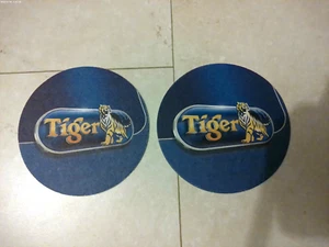 2x Genuine SINGAPORE TIGER COLLECTABLE Advert Coasters (T1=T6) Double Sided - Picture 1 of 1
