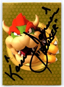Kenny James Auto Signed 2022 Panini Super Mario Gold Bowser #156 Trading Card - Bild 1 von 2