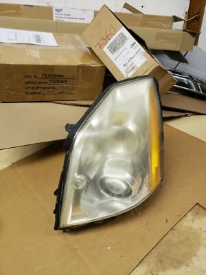 Faro delantero izquierdo izquierdo xenón HID lado del conductor Cadillac DTS 2006-2011 FABRICANTE DE EQUIPOS ORIGINALES Foto 1 de 4