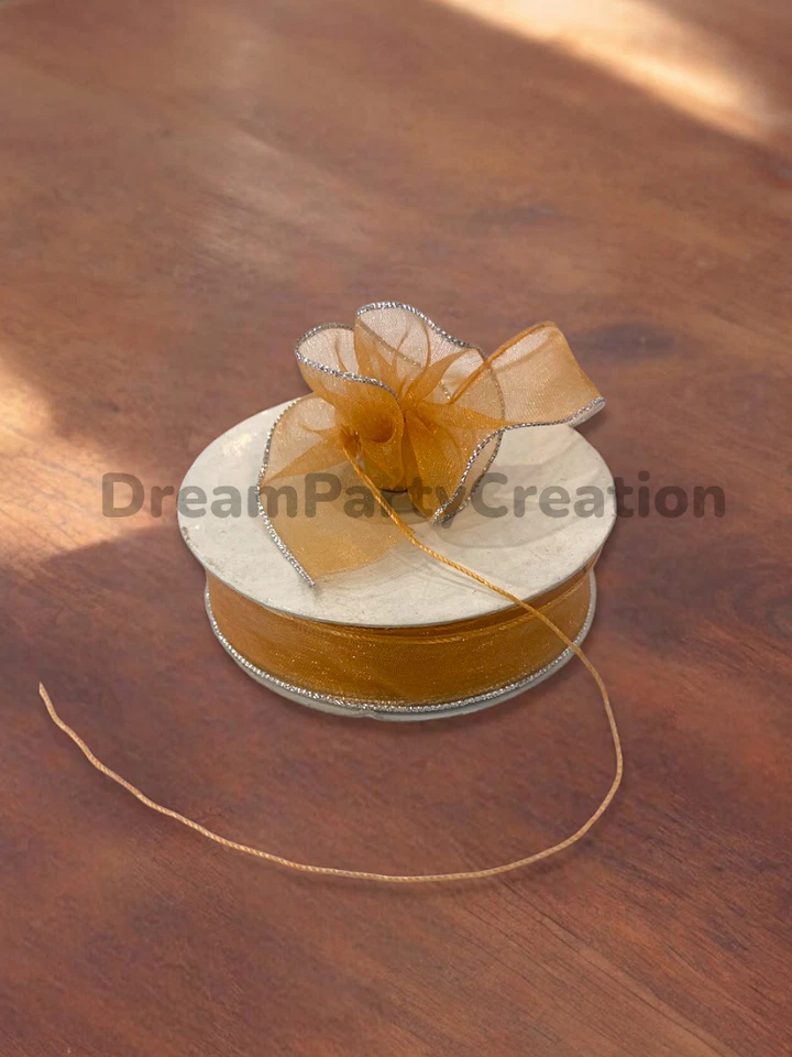 Cinta de organza 7/8" (ORO) TIRAR ARCO CON VOLANTES borde PLATEADO en un lado 25 yardas Foto 1 de 1