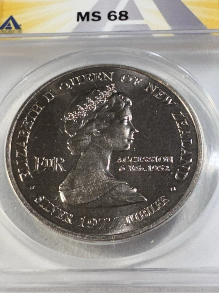 Nueva Zelanda 1977 1 dólar calificado como nuevo 68 por ANACS Waitangi Day Foto 1 de 4