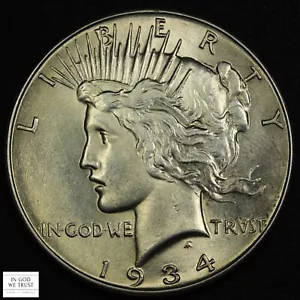 1934 Peace Silver Dollar $1 - Picture 1 of 2