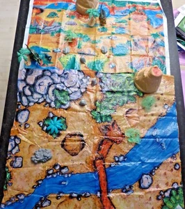 2 activity mats with several rocks , trees, Volcanos, and dinosaurs - FS AA - Picture 1 of 6