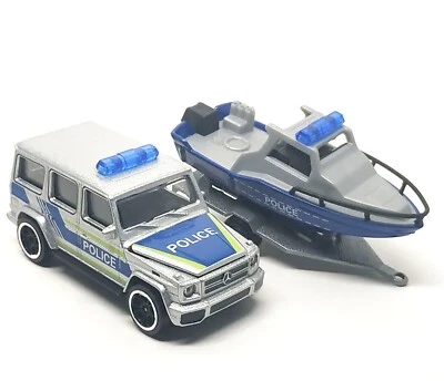 Majorette Merceds Benz AMG G63 policía con remolque para barco 1:61 sin paquete Foto 1 de 4