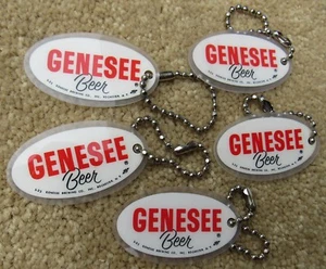 Menge 5 Genesee Bier 2-seitige Schlüsselanhänger NEU ALTER BESTAND Rochester New York hervorragender Zustand - Bild 1 von 2