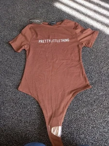 WOMENS PRETTY LITTLE THING BROWN BODYSUIT TSHIRT SIZE EXTRA SMALL XS - Picture 1 of 2