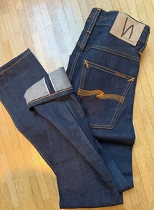 Pantalones de mezclilla NUDIE Grim Tim Dry ribete orgánico crudo con ribete W 25/L 30 nuevos sin etiquetas - Imagen 1 de 6