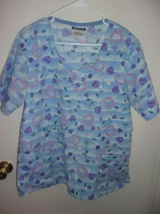 WOMAN'S SCRUB TOP SHIRT  SIZE MEDIUM BLUE  PURPLE HEART THEMED BY WORKING SCRUBS - Picture 1 of 2