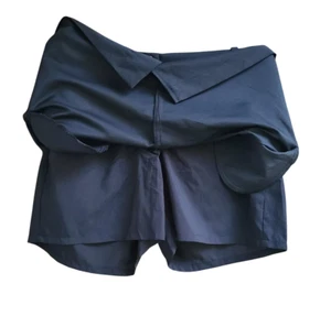 Falda corta IZOD Golf Cool FX para mujer con pantalones cortos adjuntos negra talla 12 - Imagen 1 de 9