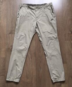 NIKE MENS SIZE L LARGE WOVEN BEIGE PANTS TROUSERS CHINO
