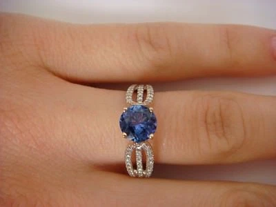 18K WHITE GOLD NATURAL TANZANITE & DIAMONDS DESIGNER RING 4.8 GRAMS SIZE 7 - Image 1 of 4