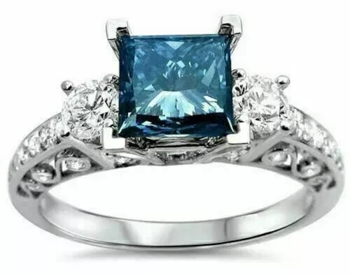 Diamante creado en laboratorio y corte princesa azul tres piedras chapado en oro blanco de 14k Foto 1 de 3