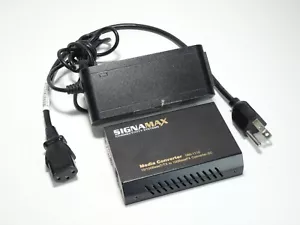 SIGNAMAX Connectivity Media Converter 065-1110 10/100BASET/TX TO 100FX - Picture 1 of 4