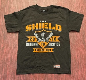 The Shield WWE Authentic Black Crew Neck Short Sleeve T-Shirt Youth Large 2018 - Picture 1 of 4