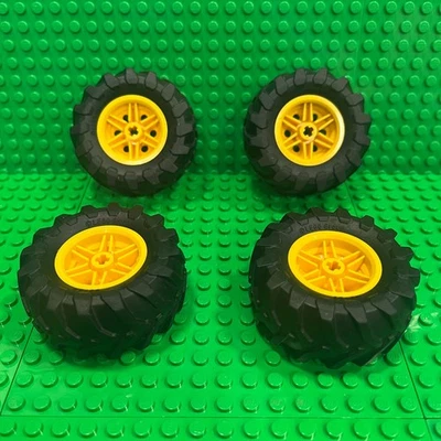 Lego Technic Wheels 56145 (30.4mm D. x 20mm) and Tires 70695 (56 X 26) Tractor - Image 1 of 3