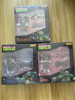 EN STOCK 1/18 JOYTOY TMNT 4 pulgadas Figuras de acción Miguel Ángel Donatello Rafael Foto 1 de 4