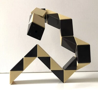 Juego de juguete transformador lógico rompecabezas serpiente vintage  Foto 1 de 4