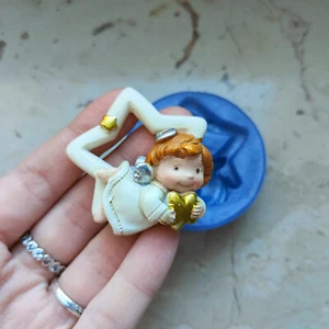 Stampo Angioletto su stella in silicone per creazioni in resina, fimo e gesso - Foto 1 di 6