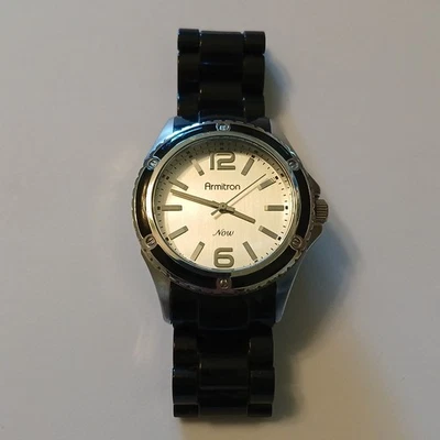 Reloj pulsera Armitron Now para mujer de acero inoxidable negro Y121E WR 100 PIES Foto 1 de 4