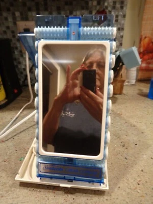 Consola rizadora Sunbeam en casa o fuera 20 Hot Rollers rizadores clips espejo Foto 1 de 4