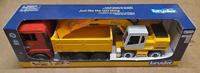BRUDER MAN TGA Dump Truck with 912 LIEBHERR Backhoe Excavator Actros 1/16 02751 - Image 1 of 4