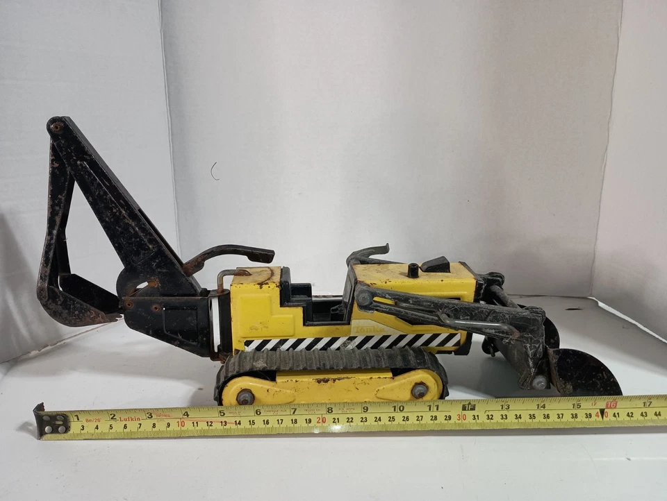 Retroexcavadora retroexcavadora de acero con cargador frontal tractor zanjadora Tonka de colección 810659 Foto 1 de 4