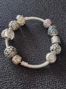 PANDORA CHARM BRACELET WITH NINE CHARMS 925 SILVER A FASHION ACCESSORY CLASSIC - Picture 1 of 8