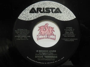 Steve Wariner: A Woman Loves / Everything's Gonna Be Alright, 45 RPM NM (Y3) - Picture 1 of 2