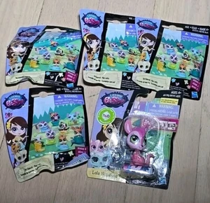 4 bolsas ciegas Littlest Pet Shop Pet Hideouts serie 2 y 1 muñeca Lola Hopalong - Imagen 1 de 6