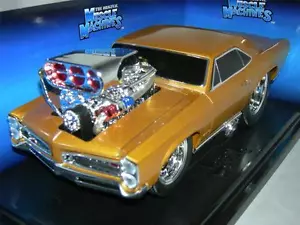 66 GTO IN BRONZE / GOLD 2002 MUSCLE MACHINE MIB. 1:18 SCALE - Picture 1 of 1