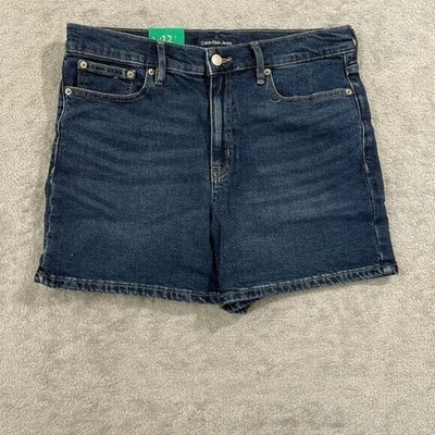NUEVO Calvin Klein Mujer 12 Denim Tiro Alto Pantalones Cortos Lavado Oscuro 99% Algodón Foto 1 de 4