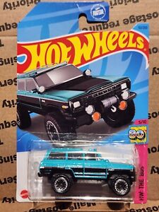 2023 Hot Wheels - Kroger Exclusive - Teal 1988 Jeep Wagoneer - Damaged Card