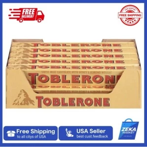 Toblerone Swiss Milk Chocolate with Honey & Almond Nougat, Christmas Chocolate - Picture 1 of 11