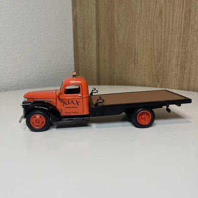 41 CHEVY FLATBED TRUCK DIECAST-AJAX TOWING-1/32 Scale - Image 1 of 4