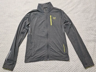 Sudadera con capucha Abercrombie & Fitch Active gris y amarillo con cremallera completa para mujer talla pequeña Foto 1 de 4