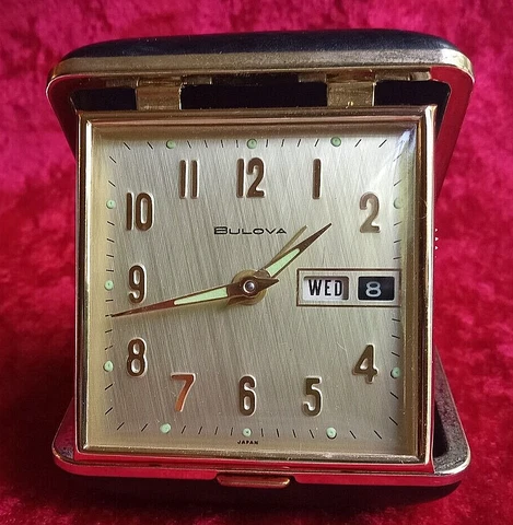 Vintage Bulova Travel Alarm Clock Black Case W/Gold Trim w/Date & Day Display Cover