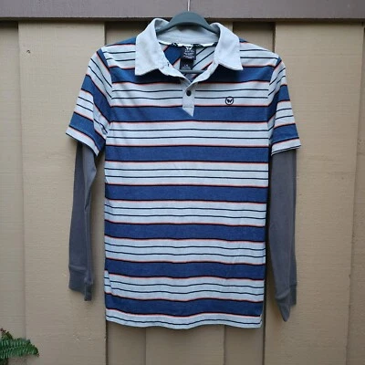 Camiseta Polo Shaun Blanco Rayas Sobre Manga Larga Simulada Niños Talla Grande Usada en Excelente Condición Foto 1 de 4