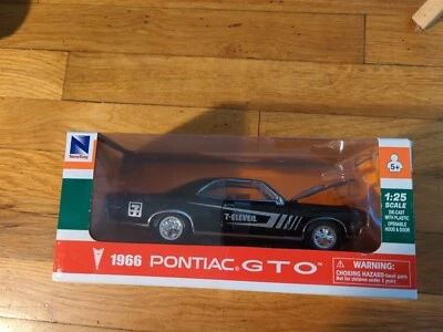 RARE 1966 PONTIAC GTO 7-ELEVEN EDITION!!! MADE BY NEWRAY 1:25 SCALE Die Cast - Image 1 of 4