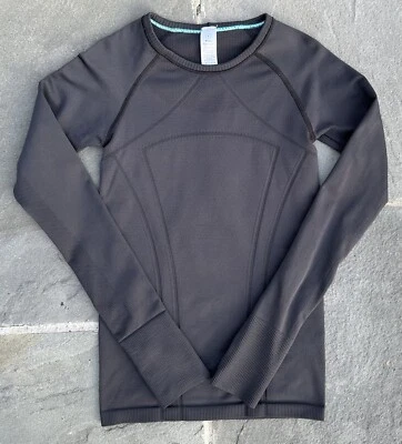 Camisa de manga larga Ivivva de Lululemon para niñas talla 8 Swiftly Fly Tech sin costuras Foto 1 de 4