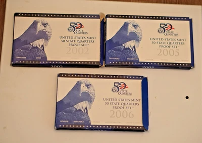 Lot of (3) US Mint Clad Proof Quarter Sets 2002 2005 2006 (INV U) - Image 1 of 2