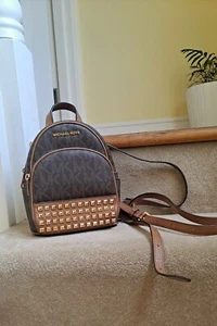 Michael Kors Rhea Studded Signature Brown Backpack In VGC - Picture 1 of 20