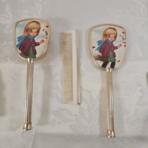 Vintage 1960s Vanity mirror brush and comb set, Big eyed girl With Bird
