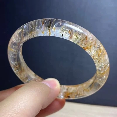 Brazalete de cristal de cuarzo Super 7 rutilado oro negro natural 57 mm AAAA Foto 1 de 4