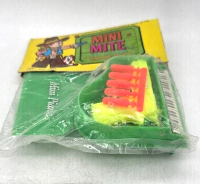 Vintage Miniature Mini Piano Toy w/ hidden gun, Spring powered, TY brand NOS, HK - Image 1 of 4