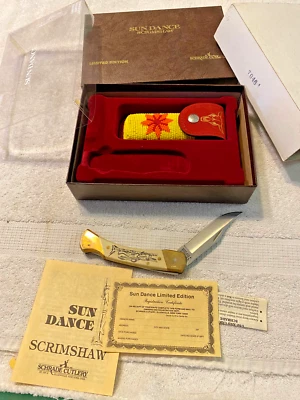 Schrade Scrimshaw Sun Dance, funda de cuero con cuentas. nuevo en caja Foto 1 de 4